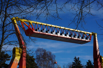 amusement park rides with blue sky as background