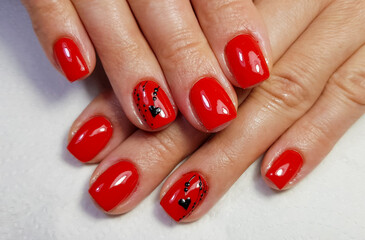 a close-up with a gel-painted manicure	