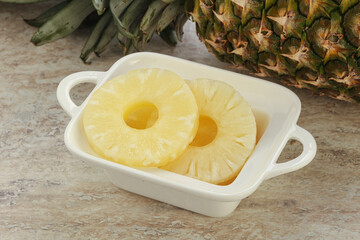 Marinated pineapple rings in the bowl