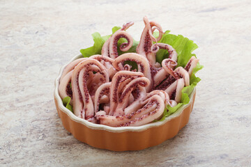 Marinated squid tentacles in the bowl
