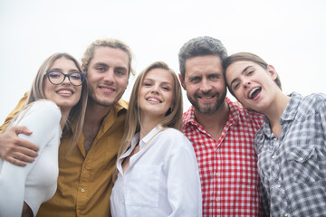 Happy friends from diverse cultures and races taking selfie. Students having fun. Youth and friendship concept. Group of friends laughing outdoor, sharing good and positive mood.
