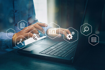 Businessman working with laptop, business analytics concept with digital data diagrams and chart,...