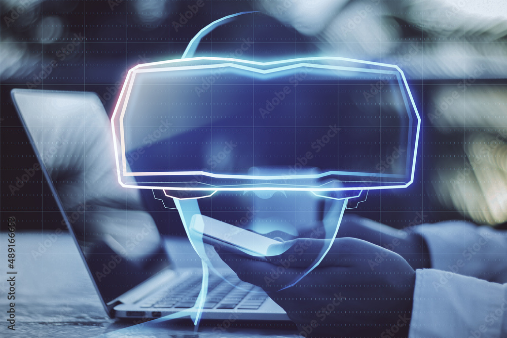 Poster close up of businessman hands using laptop with abstract hologram of digital head with vr glasses on