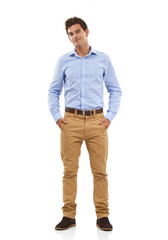 Fototapeta premium With the confidence to pull it off. Portrait of a handsome young man standing in a studio with his hands in his pockets.