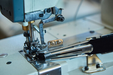 Industrial sewing production or atelier. Sewing machines for creating clothes.
