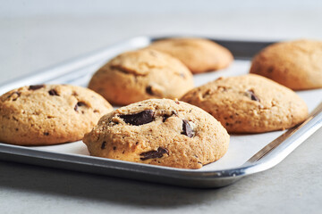 Chocolate chip cookies on table closeup. Homemade crunchy chocolate cookies bisquits on table.