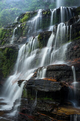 Large waterfall cascading down rocks in Blue Mountains Australia