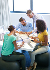 Obraz premium Explaining his method. Full length shot of a business meeting in progress.