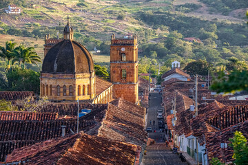 View to historic Cathedral of the immaculate conception from a higher angle and hinterlands of Barichara, Colombia
