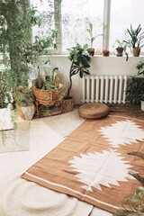 Boho interior with a lot of plants