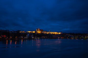 Fototapeta na wymiar Detail of the famous Castle of Prague, Czech Republic, situated over the Vltava river after sunset with beautifully painted sky on the blue hour.