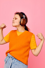 portrait of a young woman grimace headphones entertainment emotions music cropped view unaltered