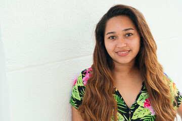 Close up portrait of smiling young African American woman tenant pose look at camera at the street