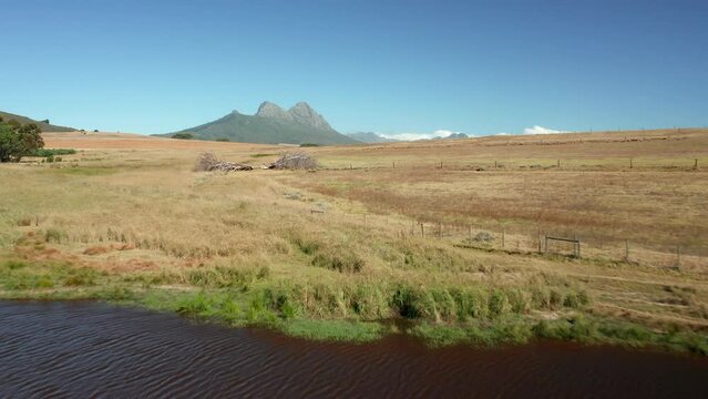 Stunning Scenery Over Savannah With View Of Simonsberg Nature Reserve In Stellenbosch, South Africa. low aerial