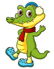 The crocodile is greeting and waving hand in the winter