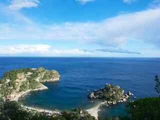 picturesque view of the Ionian Sea coast from the town of Taormina located on a hill in Sicily
