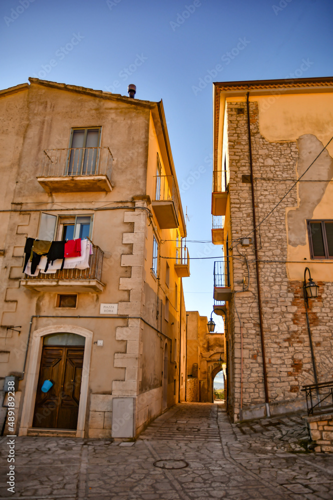 Canvas Prints A street among the characteristic houses of Casalbore, a mountain village in the province of Avellino, Italy.