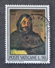 Cancelled postage stamp printed by Italy, that shows St. Dominic of Guzman, a work by Titian, circa...