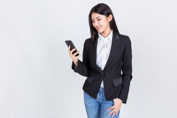 business asian woman wearing office clothing successful hold smart phone mobile and computer laptop , Technology communication lifestyles concept.