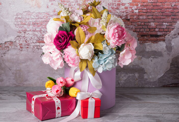 On March 8, a spring bouquet of flowers is a gift for a holiday to a woman. Greeting card