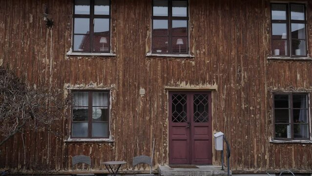 Old Vintage Building Wooden Exterior in Old Town, Sweden, Pan