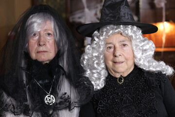 Mean senior witches looking at camera