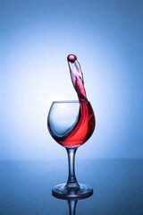 Levitation of rose wine over a glass