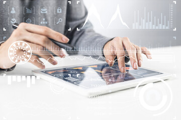 Businessman hands using tablet computer