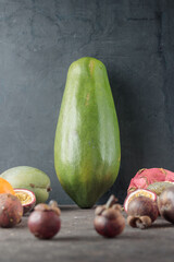 Papaya on a dark background