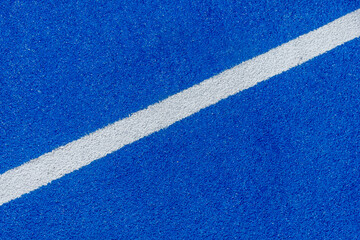 Fototapeta na wymiar Paddle tennis blue hard court texture with white line can used as soccer, football, tennis or badminton background
