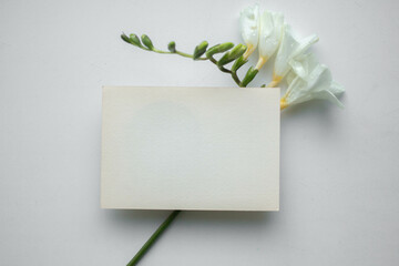 exotic flowers and invitation card