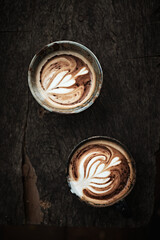 Selective focus cup of hot latte art coffee