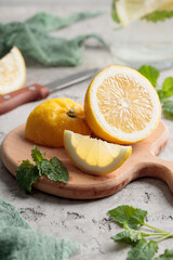 Sliced lemon on a wooden board