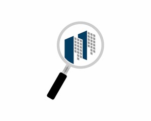 Magnifying glasses with city building inside