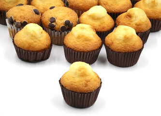 A small cupcake followed by other cupcakes