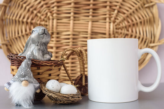 White coffee mug easter mockup with bunny and easter eggs on white background