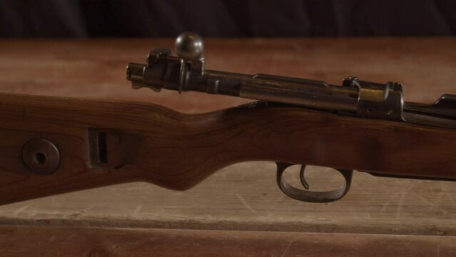Dolly of unloaded Kar98 rifle with an open bolt