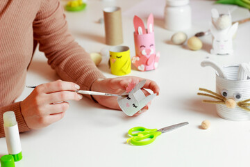 Reuse concept art from toilet tube. Eco friendly bunny craft. Handmade decoration easter rabbit. Kids DIY ideas