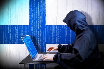 Anonymous hooded hacker, flag of Finland, binary code - cyber attack concept