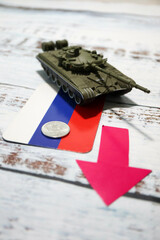 russian flag with toy tank and rouble coin crisis war conflict ukraine wallpaper