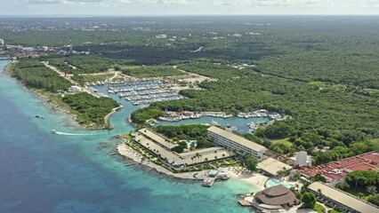 Cozumel Mexico Aerial v5 high angle panning shot capturing beautiful summer caribbean sea landscape of marina caleta and nearby cityscape - September 2020