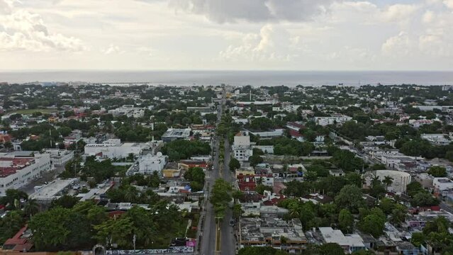 Cozumel Mexico Aerial v22 spectacular view drone flying above av lic bentito juarez capturing grid cityscape toward ferry terminal with endless caribbean sea and horizon at daytime - September 2020