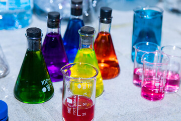 colorful liquids in chemical flasks
