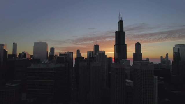 Drone Flying Chicago Skyline at Sunrise