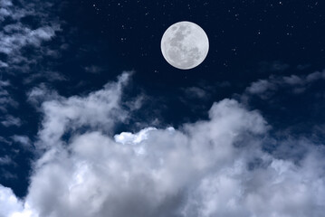 Fototapeta na wymiar Full moon with clouds on sky.