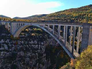 View of road bridge Pont de l'Artuby built of reinforced concrete and spanning majestic canyon Verdon Gorge in Provence region in southern France.