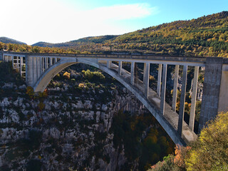 View of road bridge Pont de l'Artuby built of reinforced concrete and spanning majestic canyon...