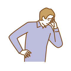 顔に手を当ててうつむき落ち込む男性