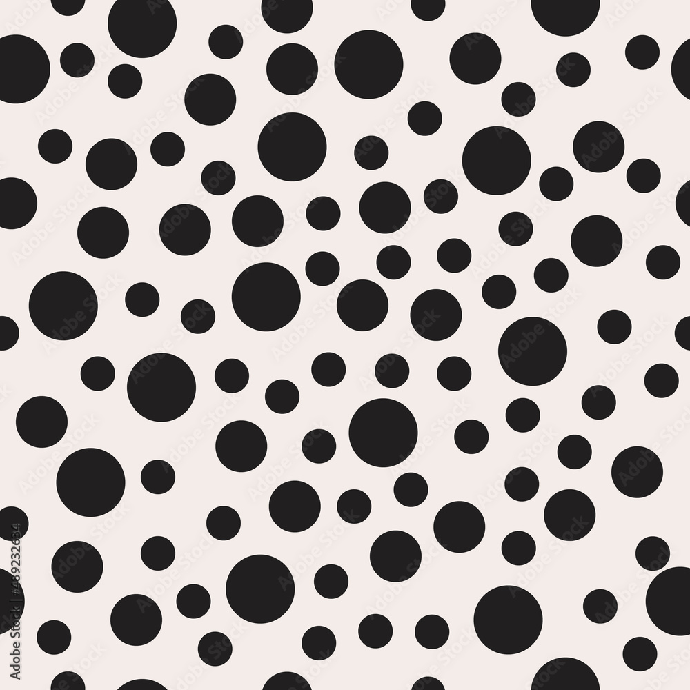 Fototapete black polka dots in vector space. simple peas of different sizes.