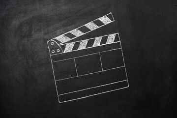 cinema clapper board drawn on the blackboard